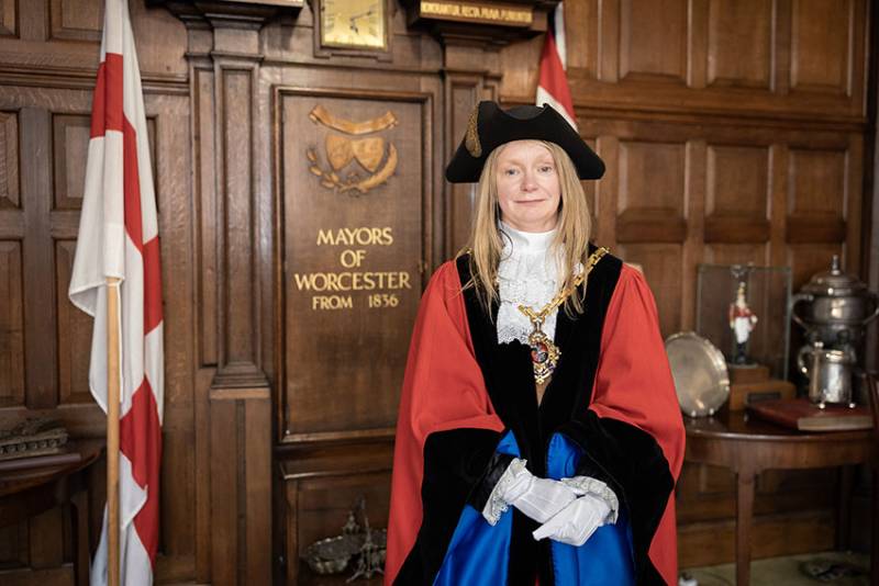 Mayor of Worcester Mel Allcott stood in her mayoral robe in the mayor's parlour