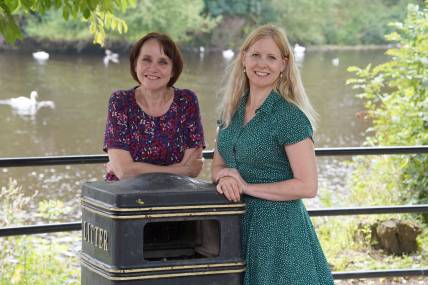 Zoe Cookson and Karen Lewing stood next to a City Council bin